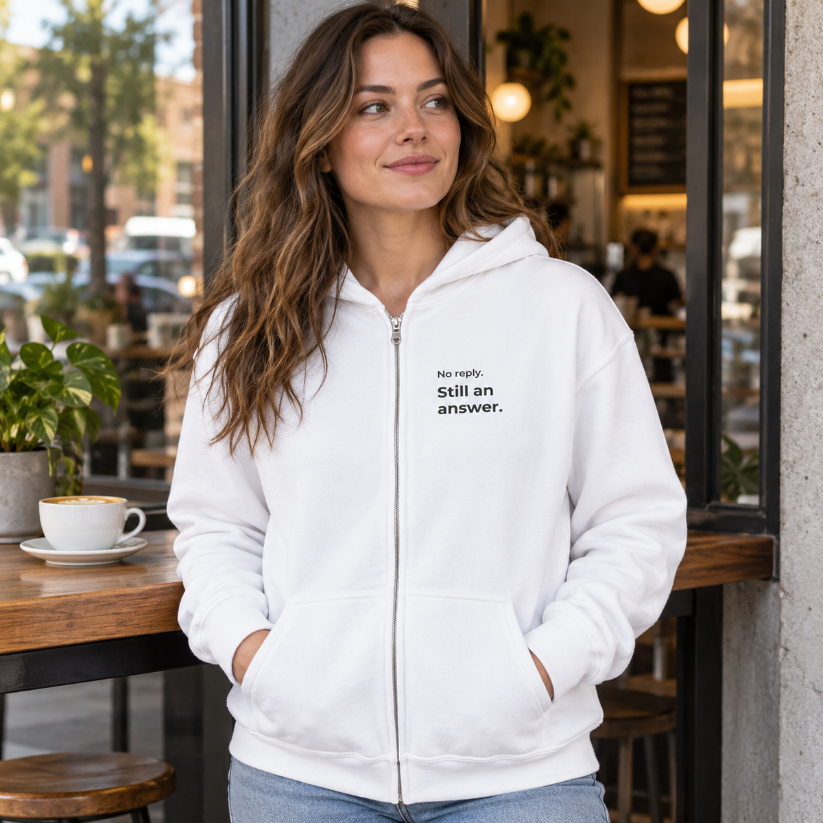 No Reply. Still an Answer. Zip Hoodie — lifestyle photo in a café setting