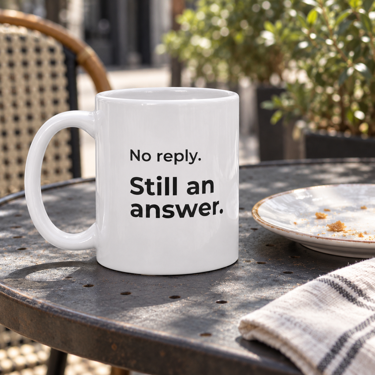 No Reply. Still an Answer. Mug — lifestyle photo in a café setting