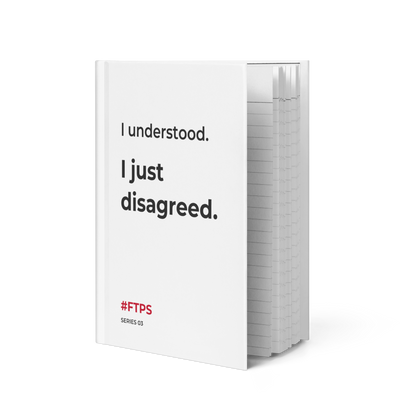 I Understood. I Just Disagreed. Notebook — standing slightly open, front cover and lined pages