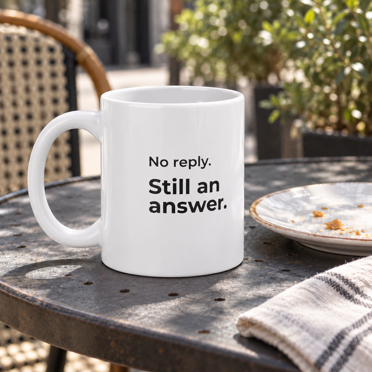 No Reply. Still an Answer. Jumbo Mug — square café lifestyle photo of the20oz ORCA mug